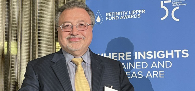 Azzad CEO Bashar Qasem receives a 2023 Lipper Fund Award on March 23 in New York.